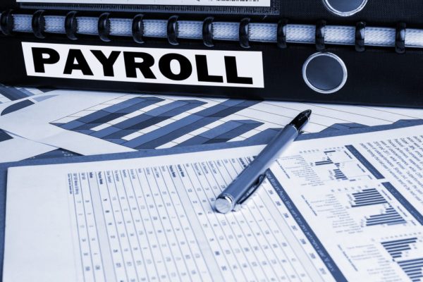 payroll concept on document folder